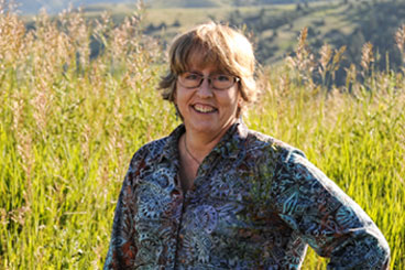 lab scientist Karen Clark outside Bozeman Clinic in Bozeman, MT